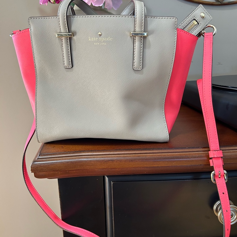 Kate Spade tan and coral pink handbag.  One zipper pocket inside